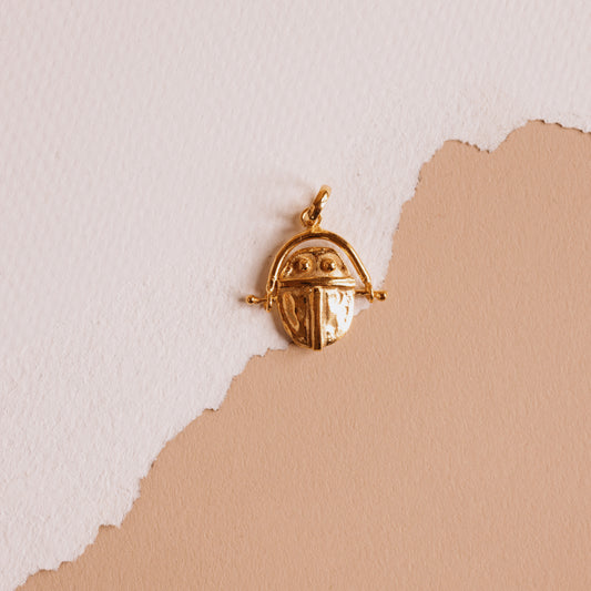 The Gold Spinning Scarab