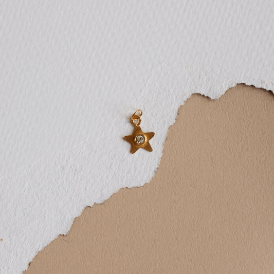 The Tiny Gold Shiny Star